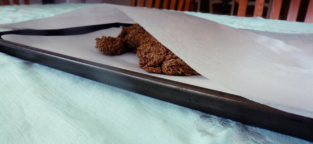 cracker mix on parchment paper