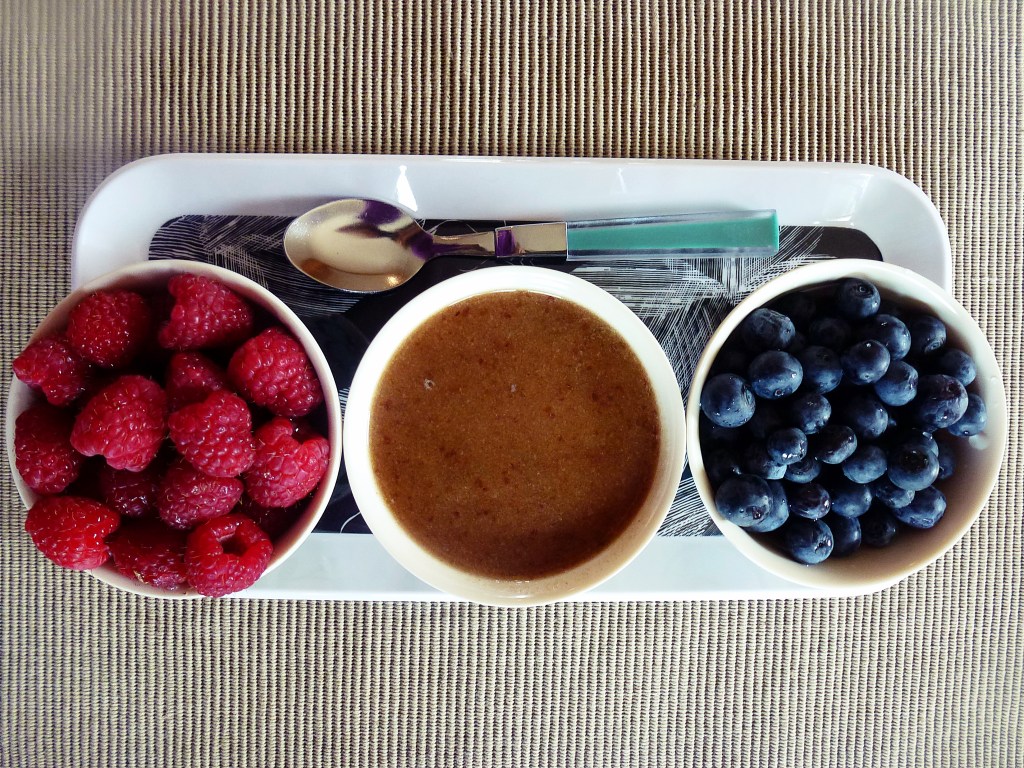 Organic raspberries, blueberries, and date syrup